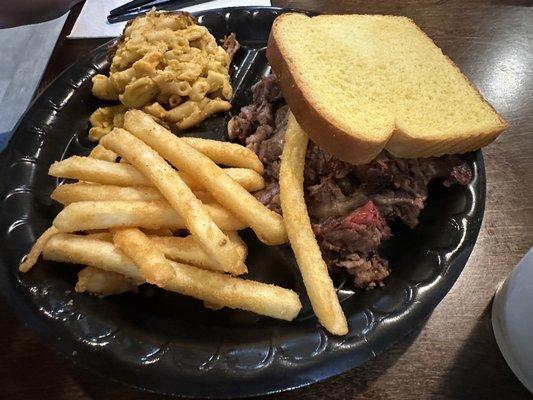 Brisket with fries and Mac and Cheese with a slice of bread