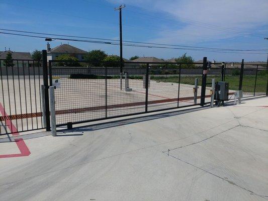 Secure gate with digital keypad.