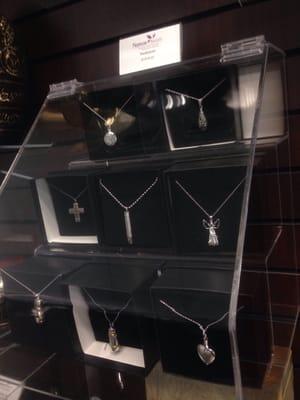 Necklaces that can hold a small amount of ashes