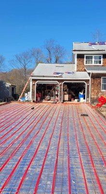 Are you tired of shoveling snow? Here is a radiant heated driveway.