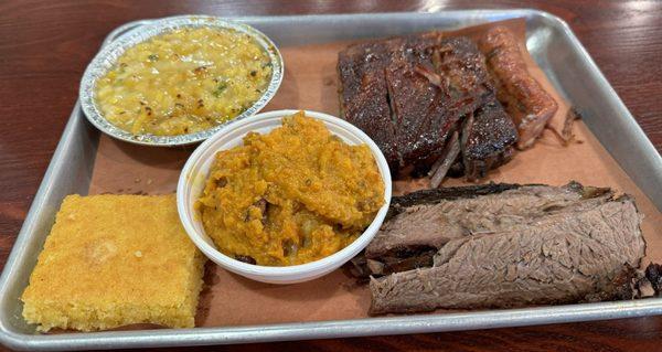 Hand Sliced Prime Brisket, ribs, sausage, and delicious sides