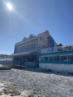 Rebuilding the deck that leads to beach and ocean. You can still access the restaurant while they are constructing.