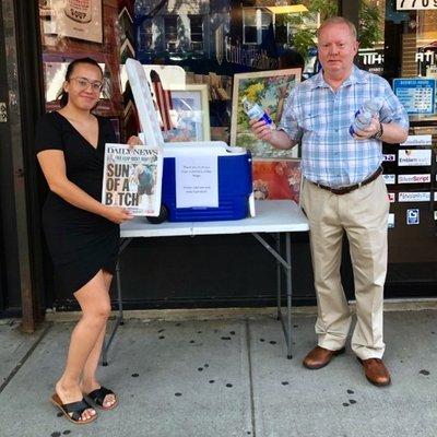 Louis Peters hands out water on a hot summer day!