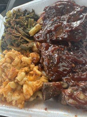 Beef ribs, Mac n cheese, greens, extra seasoning and bbq sauce