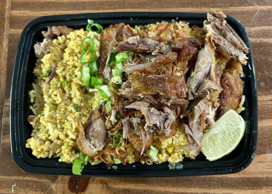 Crispy Duck Fried Rice  Authentic Thai fried rice, egg, scallion, curry powder, garlic, fried shallot and crispy duck.