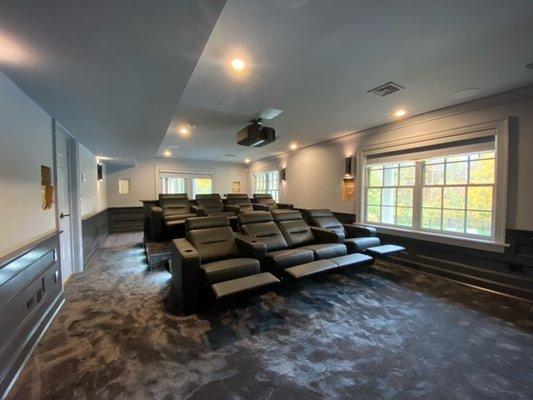 Home Theater Room we installed with stadium seating for 8, projector with screen for everyone to enjoy!