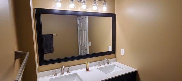 New mirror, lights, dual vanity, outlets installed