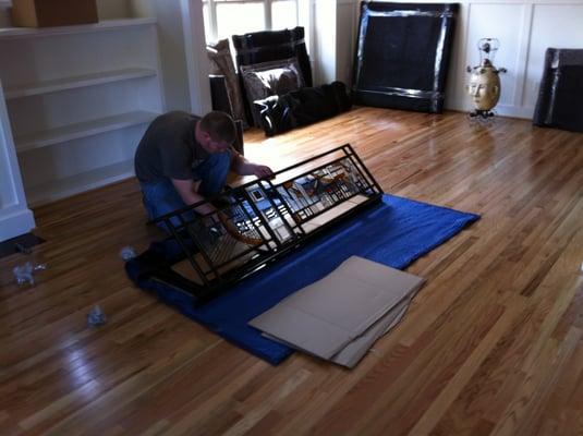 Stained glass panels being padded and prepared for transportation