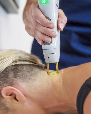 Smooth back of neck with Candela laser hair removal. Bye-bye neck fuzz, hello sleek look!