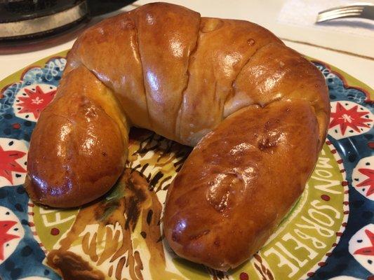 Cuernito (croissant shaped bread made with lard or vegetable oil instead of butter; this version is like egg bread)