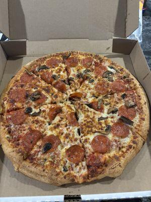 Pepperoni and mushroom pizza