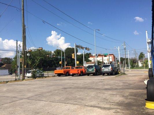 Huge parking lot with a couple kool trucks. I think they also sell used tires.