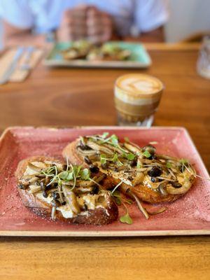 Mushroom Toast with pickled red onions on toasted Acme sourdough