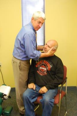 Cervical rotation adjustment seated