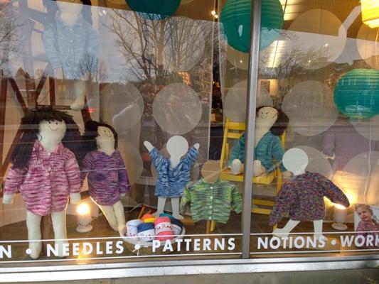 A window full of cute spring sweaters for little ones!