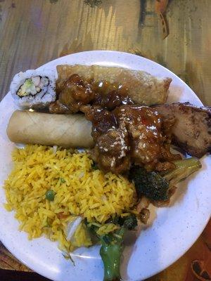 Egg roll, vegetable spring roll, pork fried rice and sesame chicken