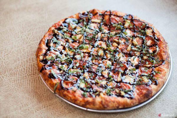 Da Bomb - Hideaway red sauce, mozzarella, pepperoni, Genoa salami, pineapple, Parmesan-herb shake, topped with fresh basil & balsamic glaze.