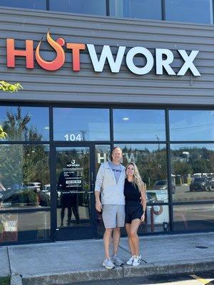 Co-owners Raeanne & Trevor in front of HOTWORX Seattle (Interbay near Magnolia and Queen Anne)