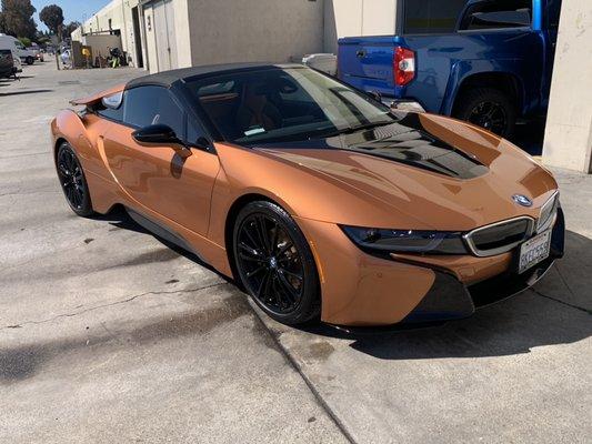 Bmw I8 completes after a full right side collision