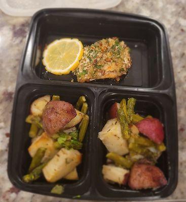 Pecan crusted salmon with roasted red potatoes and asparagus.