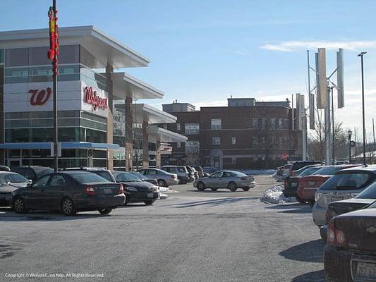 The overlapping sections of roof offer space for 800 solar panels to generate electricity for Walgreens & its neighbors.