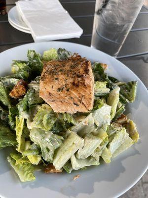 Salmon over Caesar salad