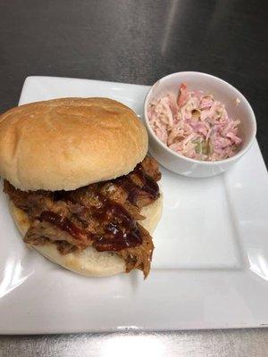 Pulled pork sandwich with a side of coleslaw. Yum