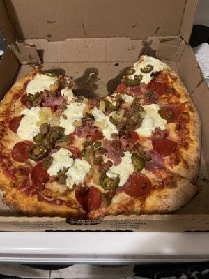 A large meat lovers with fresh mozzarella, pineapple & jalapeño!! Sooo good!!!