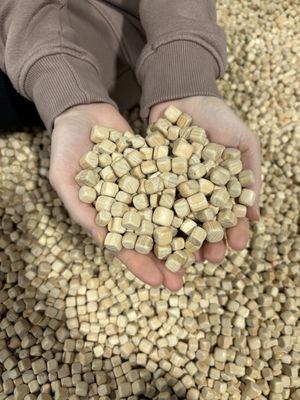 The wood pellets in one of the play areas.