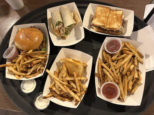 Grilled cheese, double burger, chicken ceaser wrap, patty melt, and piles of fries