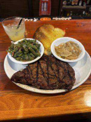 Ribeye, Green beans w/bacon, and a side of grilled onions for my steak. Oh! And garlic toast!