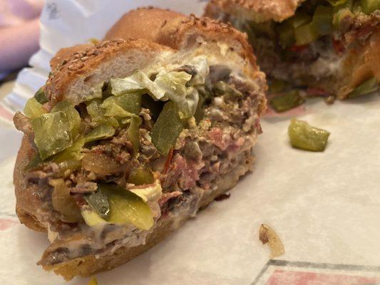 Steak Bomb with Salami, mayo and extra pickles on a Delicious Soft Braided Roll