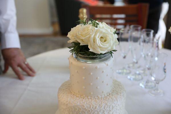 Our beautiful 50th anniversary cake from Jill's Cake Creations! (I added the cake topper as a reminder of our wedding flowers.)