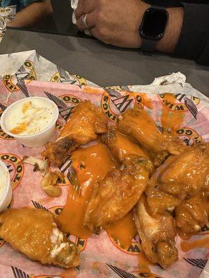 Chicken wings with buffalo sauce.