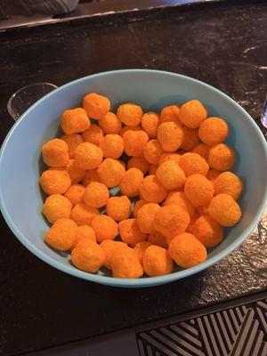 They offer cheese puffs during football games.