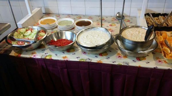 Salad, dessert and bread buffet table