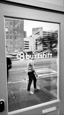 Signage going up at the new BuzzShift Office in Dallas