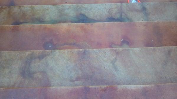 Concrete acid stain applied to patio stairs.