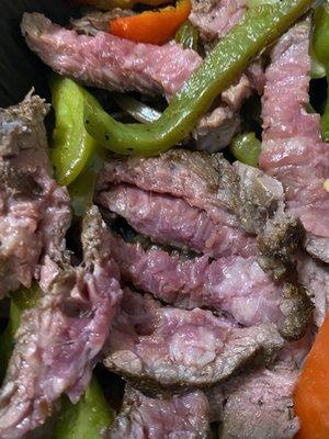 Raw steak fajita.