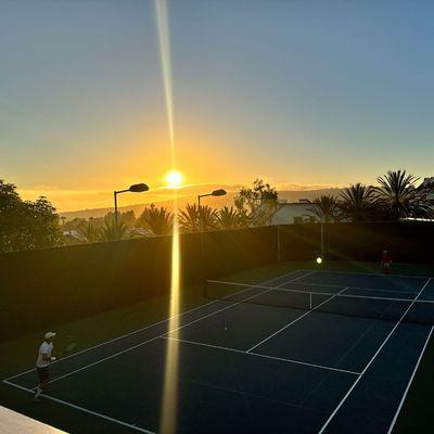 Join us for sunset tennis matches and unbeatable views! Give us a call to reserve your court: (949) 240-2104