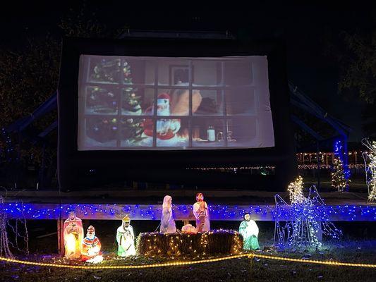 Holiday movies playing outside