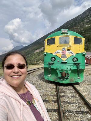 I pose in front of the engine at the Bennett stop