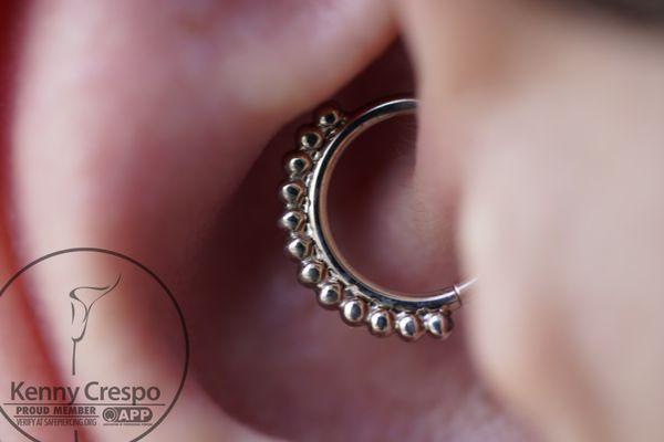 Gold jewelry for body piercings. Schedule your visit at newflowerstudio.com.