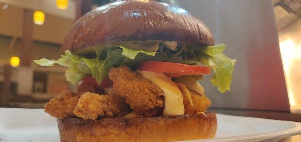 Chicken Strip Sandwich  Chicken Strips, Jr. Sauce, on a Brioche Bun w. all the Fixins