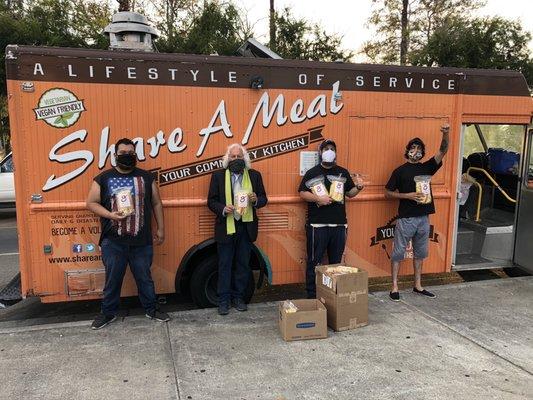 Share a meal distributing popcorn and burritos to our community