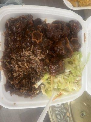 Ox tails, cabbage and dirty rice and beans