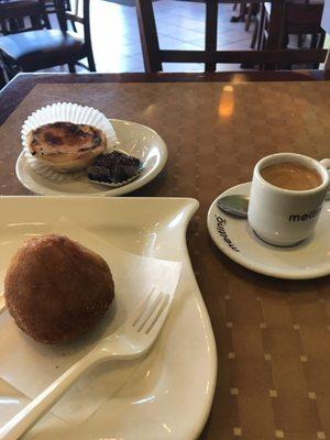 A little bit of everything! Pastel de nata, brigadeiro, coxinha, and an espresso.