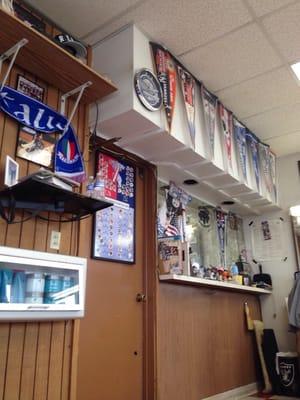 Zavala's barber shop sports wall