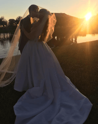 See how long the train is. Look to see in the other picture how she did the bustle. It was almost like there was no train at all. AMAZING!