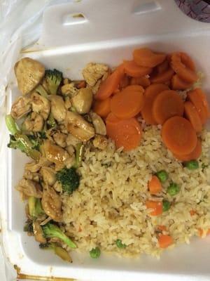 Hibachi chicken with broccoli, sweet carrots, & fries rice.